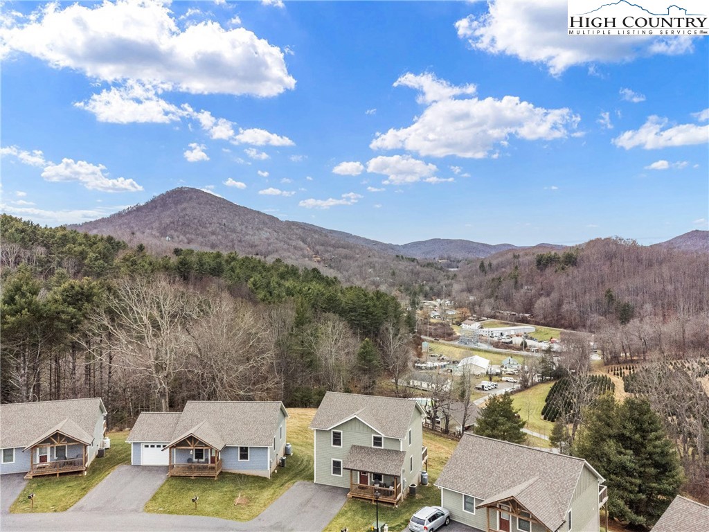 513 Townhomes Place, Unit 27 Boone, NC 28607 - Photo 4 of 33 a view of a lake in middle of the town