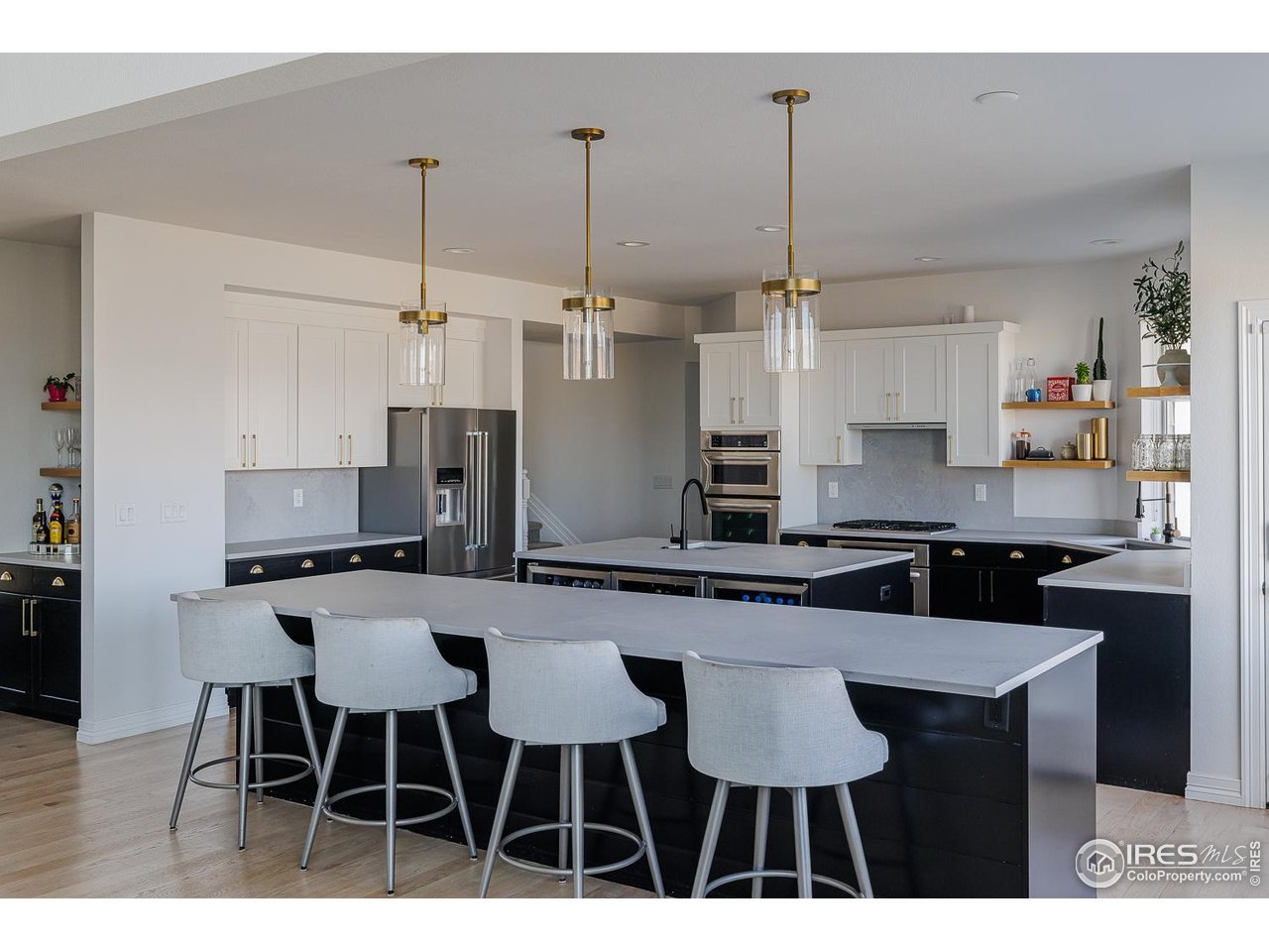 7401 Deerfield Road Longmont, CO 80503 - Photo 11 of 49 Breakfast bar and lots of preparation space