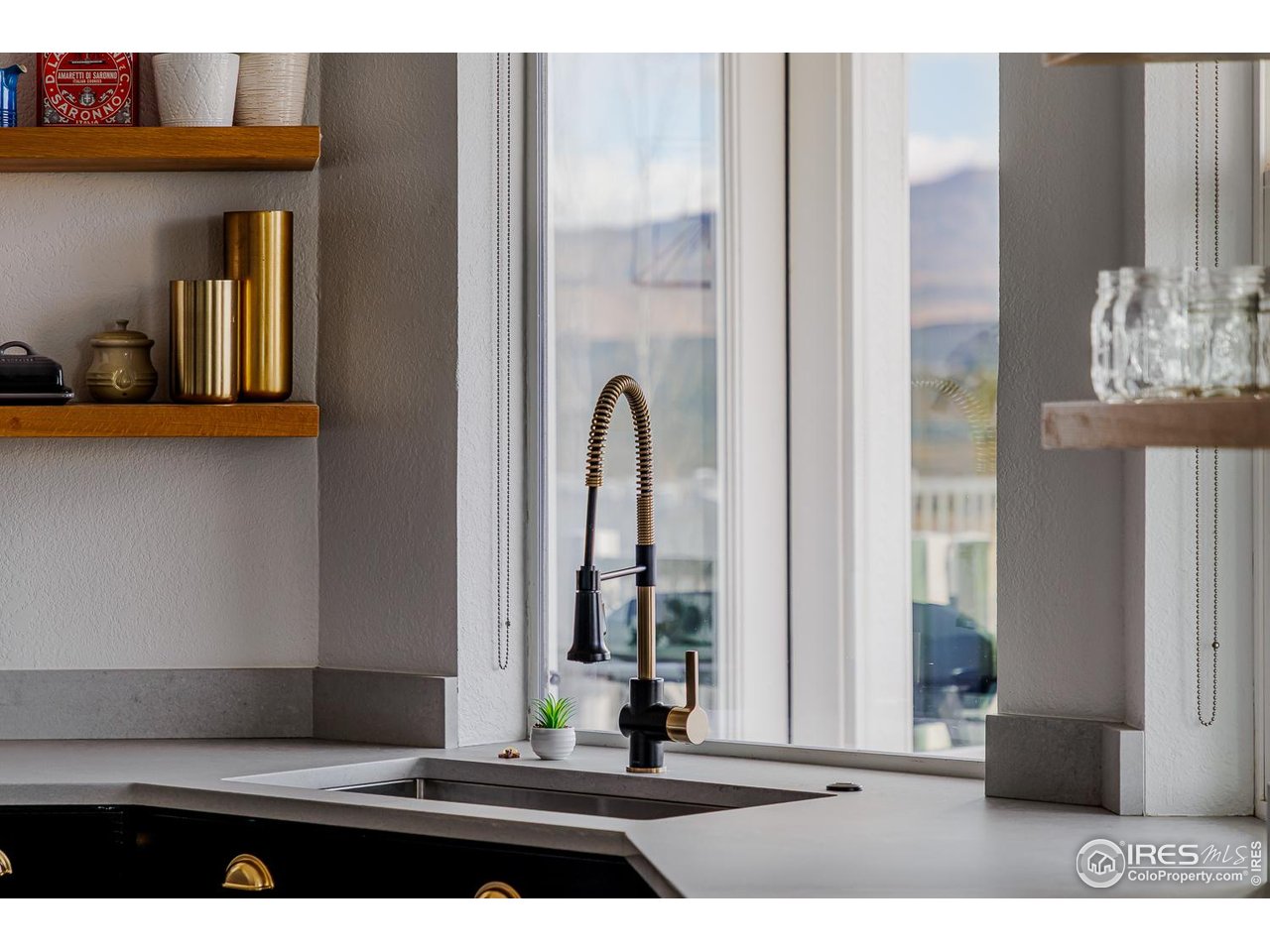 7401 Deerfield Road Longmont, CO 80503 - Photo 13 of 49 From the kitchen, overlooking back patio and fenced private pool