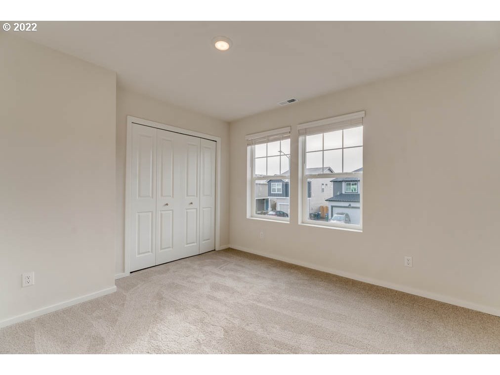 2674 26th Loop Springfield, OR 97477 - Photo 10 of 23 a view of an empty room with a window