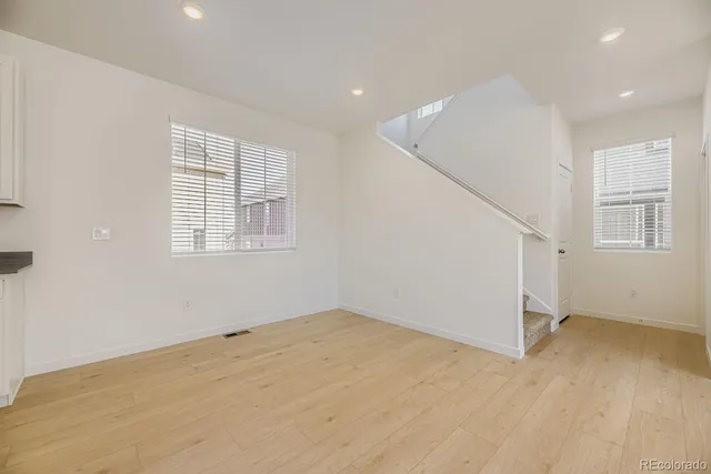 an empty room with windows