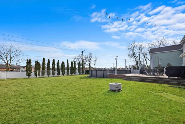 a backyard of a house with seating space