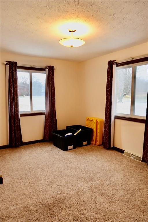 45 Plummer McCullough Road Mercer, PA 16137 - Photo 21 of 50 a view of an empty room with a window