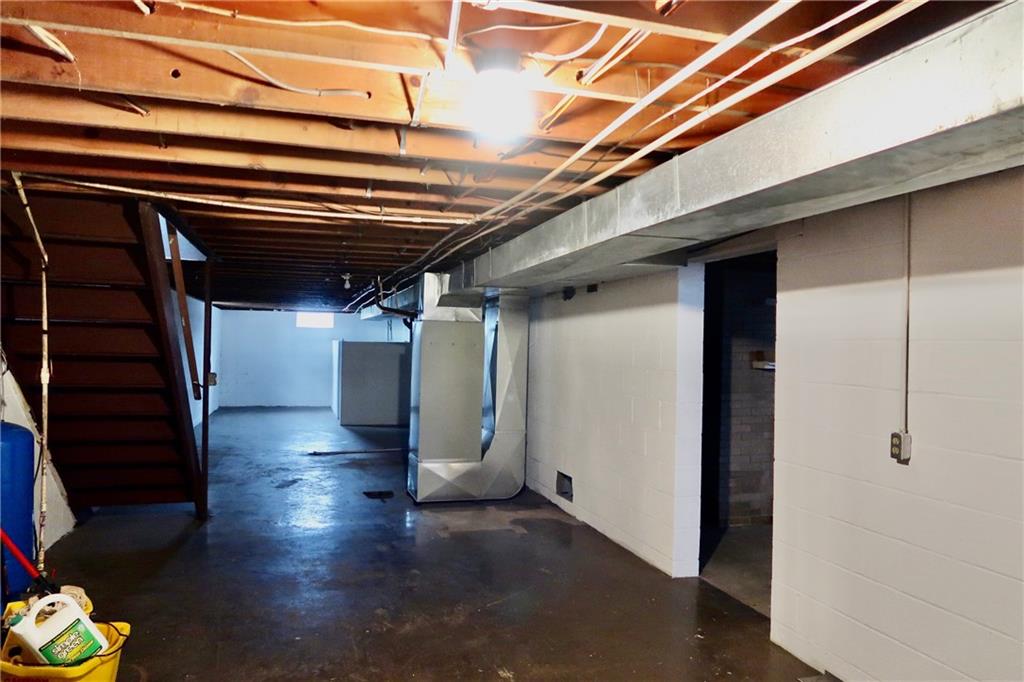 45 Plummer McCullough Road Mercer, PA 16137 - Photo 25 of 50 a view of a hallway with wooden floor and stairs