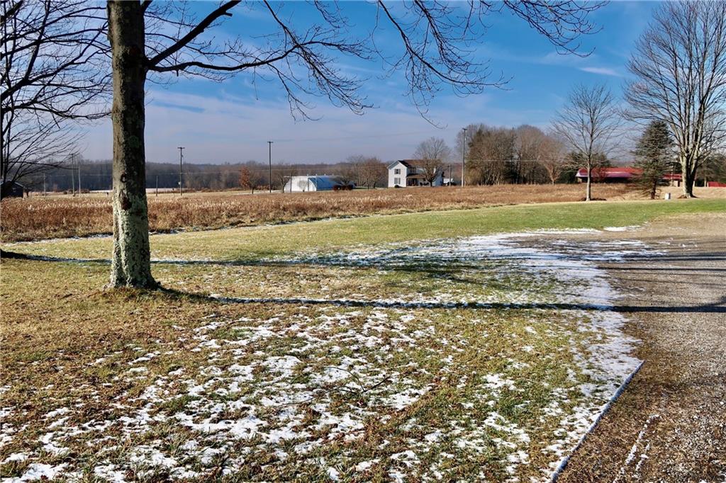 45 Plummer McCullough Road Mercer, PA 16137 - Photo 34 of 50 a view of a yard with an outdoor space