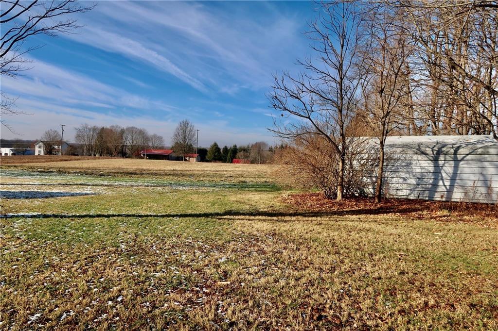 45 Plummer McCullough Road Mercer, PA 16137 - Photo 36 of 50 a view of a yard with large trees