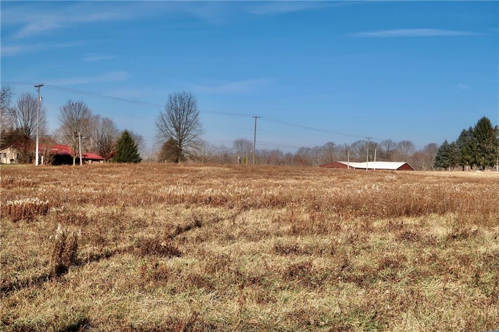 45 Plummer McCullough Road Mercer, PA 16137 - Photo 45 of 50 a view of a field with a building in background