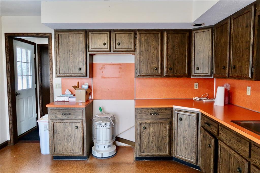 45 Plummer McCullough Road Mercer, PA 16137 - Photo 10 of 50 a kitchen with stainless steel appliances granite countertop a refrigerator and a sink