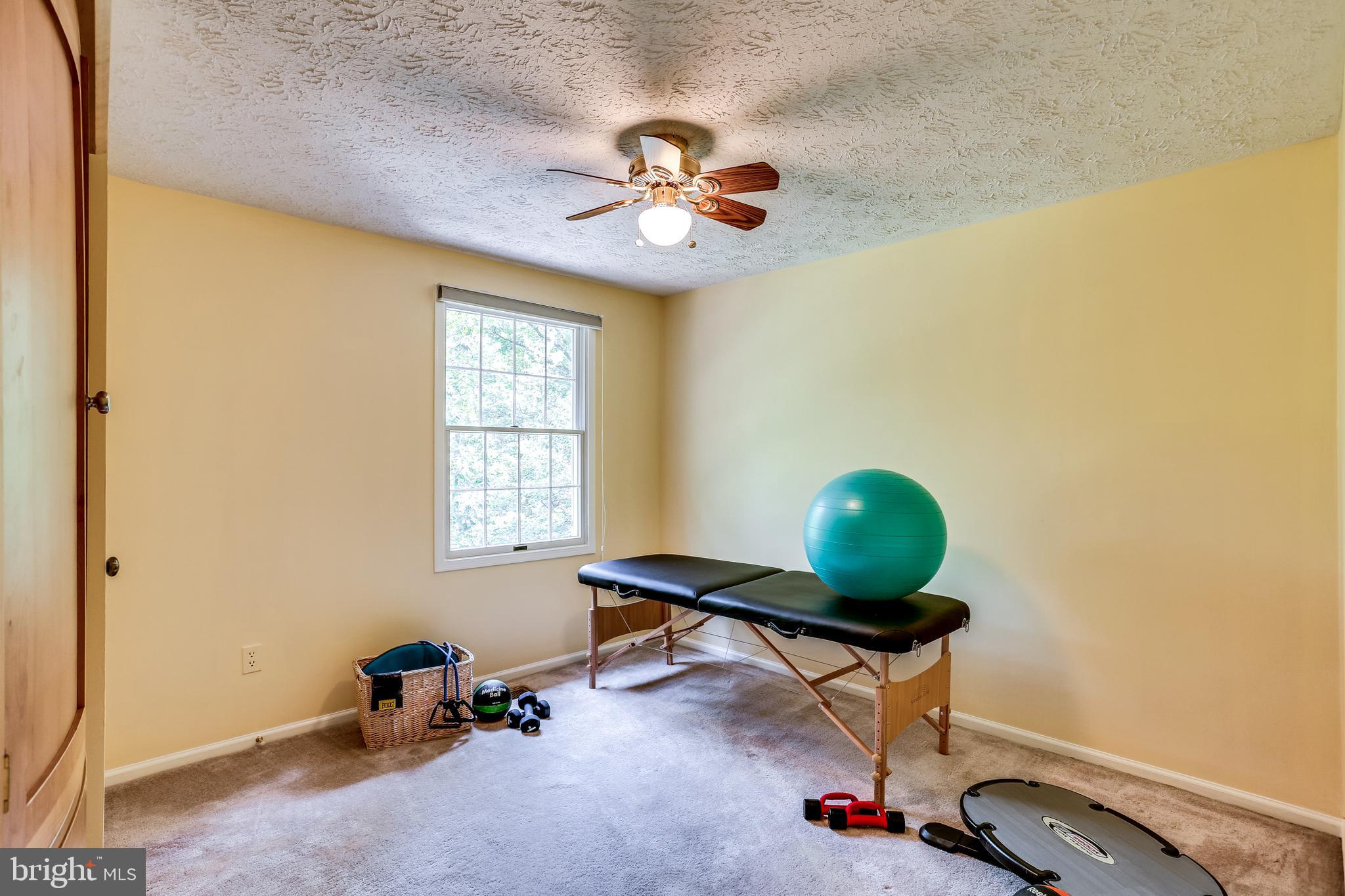 1395 Concord Point Lane Reston, VA 20194 - Photo 24 of 68 Bedroom #5 with ceiling fan overlooks rear yard