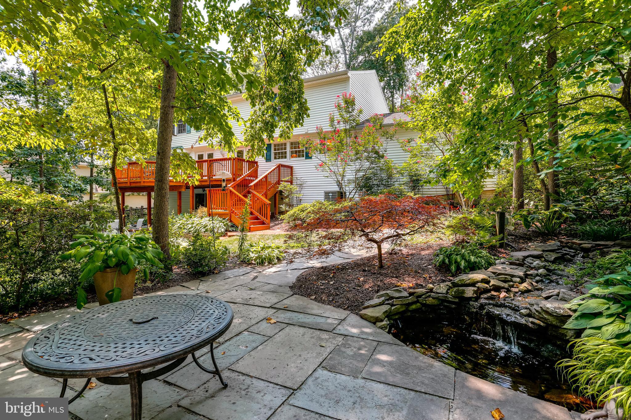 1395 Concord Point Lane Reston, VA 20194 - Photo 44 of 68 This patio has a small pond and waterfall