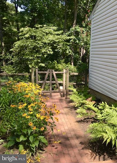 1395 Concord Point Lane Reston, VA 20194 - Photo 49 of 68 Brick walkway from driveway to backyard