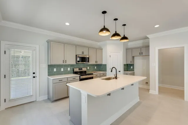 an empty room with a empty space and a window