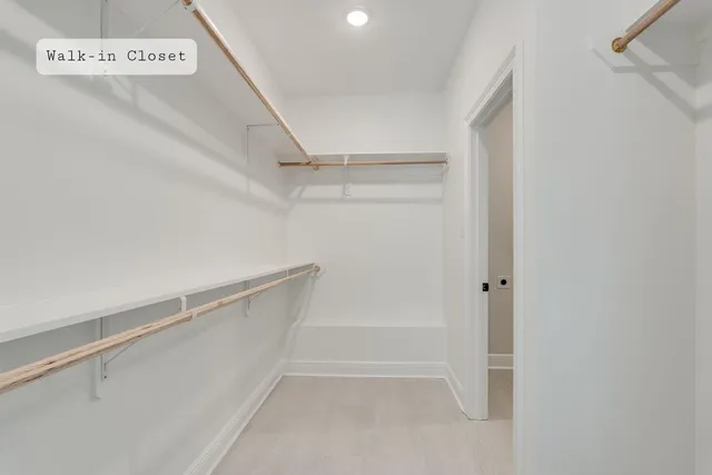 a bathroom with a double vanity sink and mirror