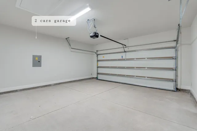 a bathroom with a sink a toilet and a large mirror