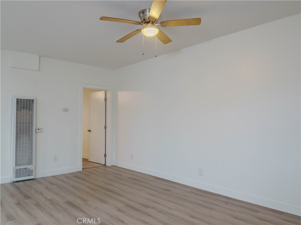 9413 Garfield Street Riverside, CA 92503 - Photo 13 of 19 wooden floor in an empty room