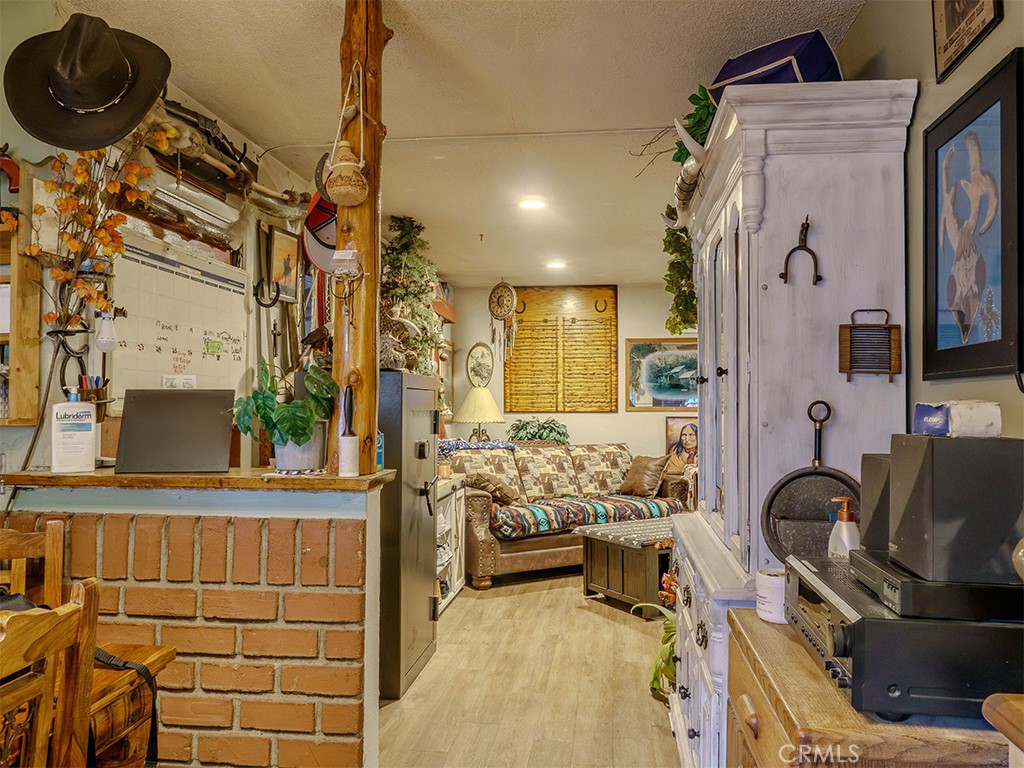 9413 Garfield Street Riverside, CA 92503 - Photo 22 of 33 a bathroom with a sink a mirror and shower