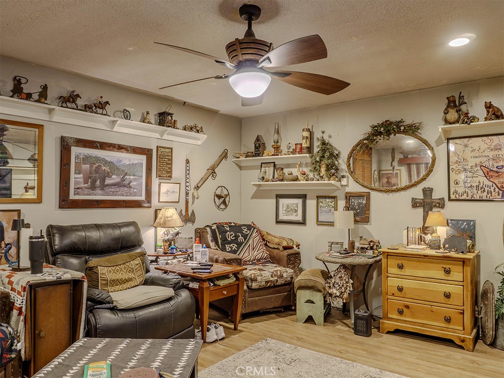 9413 Garfield Street Riverside, CA 92503 - Photo 25 of 33 a living room with furniture and a window