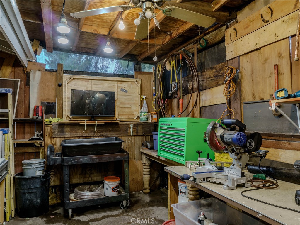 9413 Garfield Street Riverside, CA 92503 - Photo 33 of 33 a room with furniture and a flat screen tv