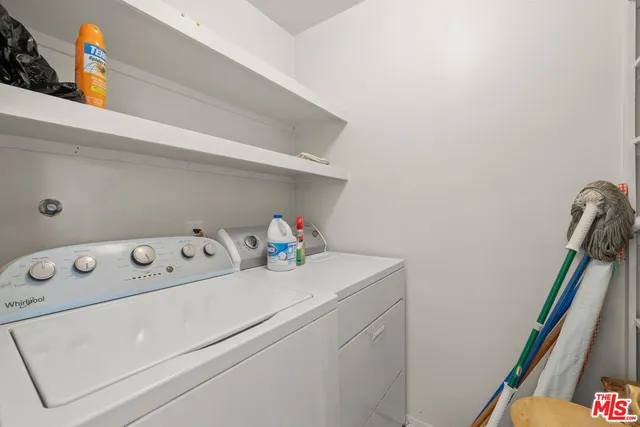 a view of a house with backyard porch and sitting area