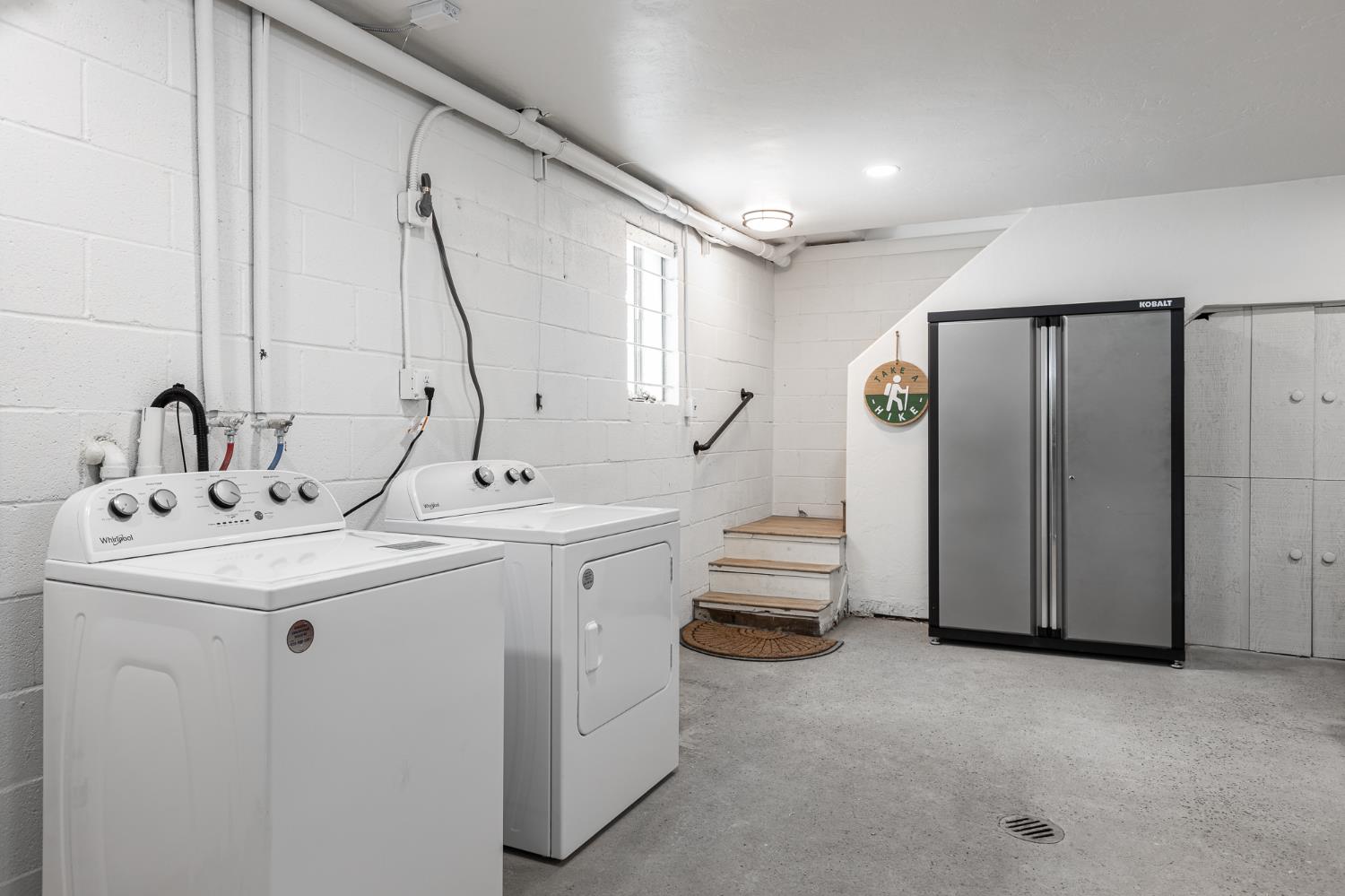 42145 Tollhouse Road Shaver Lake, CA 93664 - Photo 3 of 22 a bathroom with a double vanity sink and a mirror