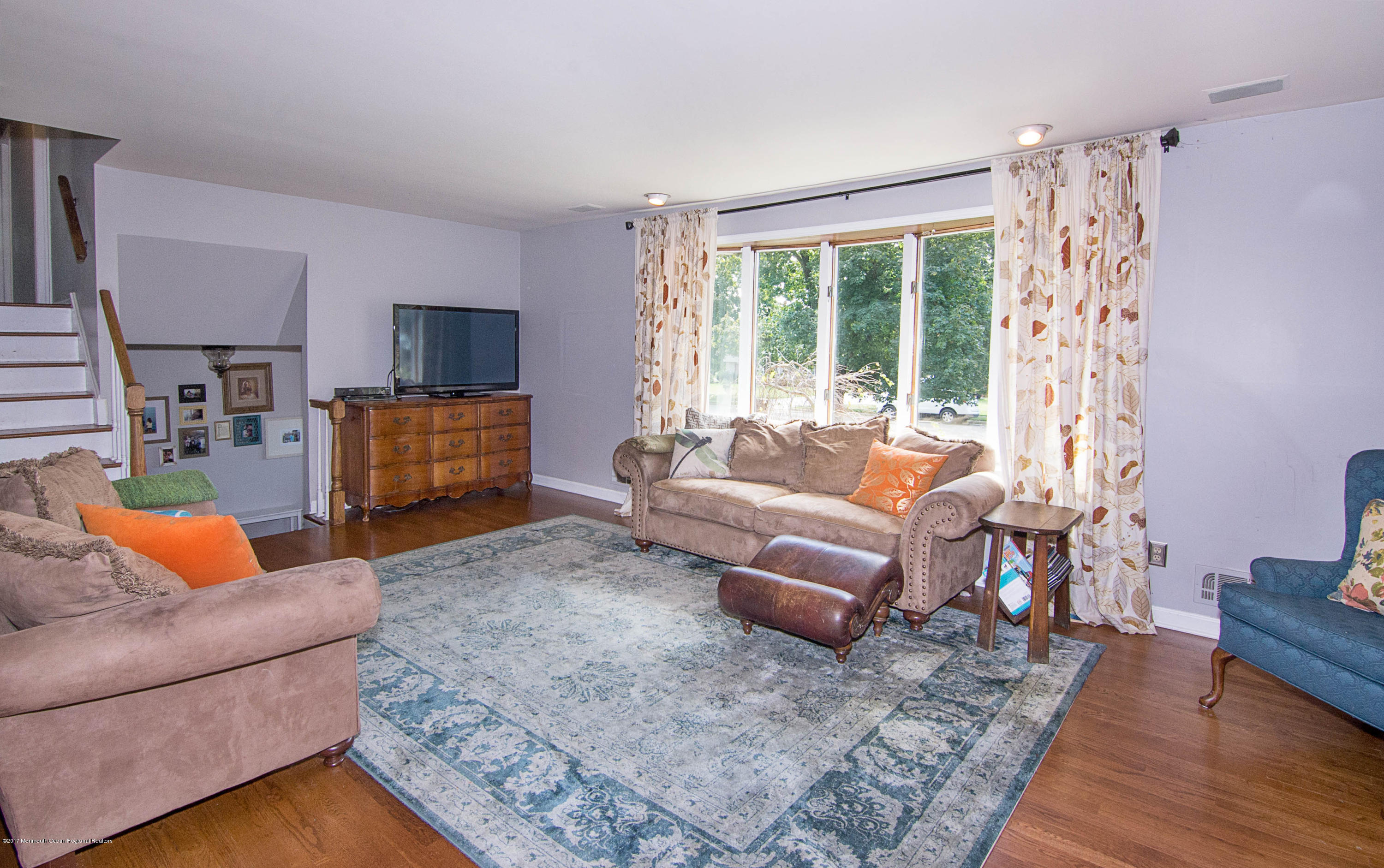 83 Wellington Road Freehold, NJ 07728 - Photo 12 of 34 _RMJ2516.jpg living room