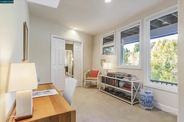 a room with furniture and a window