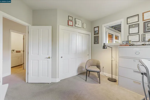 a livingroom with window and a couch
