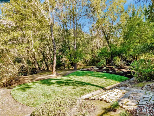 a view of a city with mountains in the background