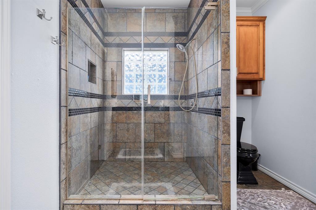 515 Copano Cove Road Rockport, TX 78382 - Photo 20 of 39 a bathroom with a shower