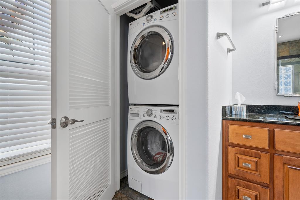 515 Copano Cove Road Rockport, TX 78382 - Photo 21 of 39 a utility room with dryer and washer