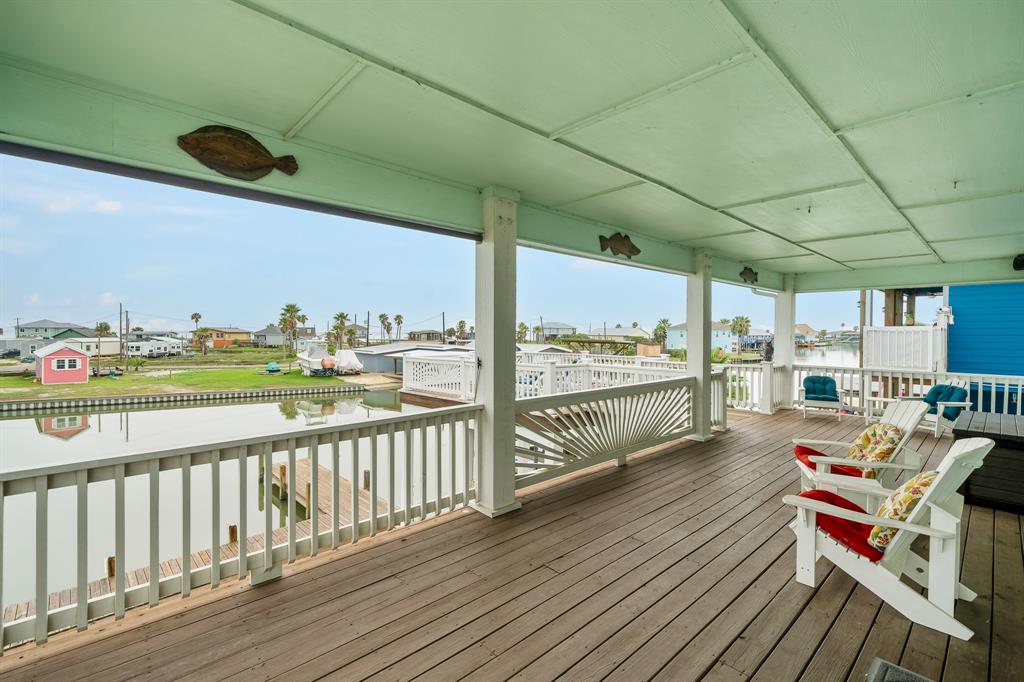515 Copano Cove Road Rockport, TX 78382 - Photo 24 of 39 a view of a chairs and table in the balcony