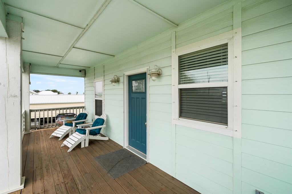 515 Copano Cove Road Rockport, TX 78382 - Photo 6 of 39 a living room with patio area