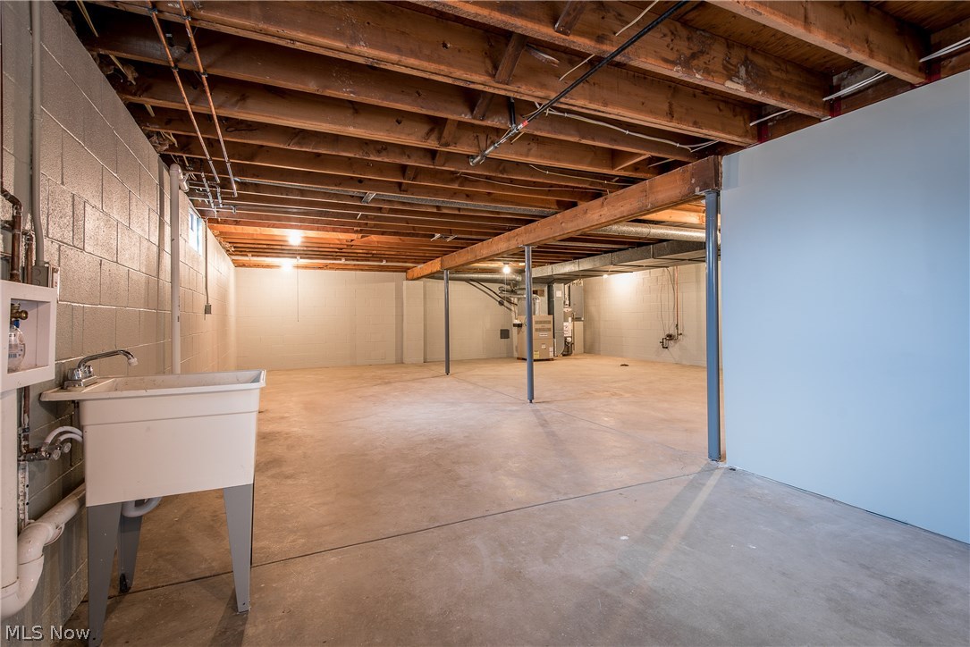 2194 Springfield Center Road Akron, OH 44312 - Photo 22 of 26 The basement offers plenty of opportunity to finish for added living space
