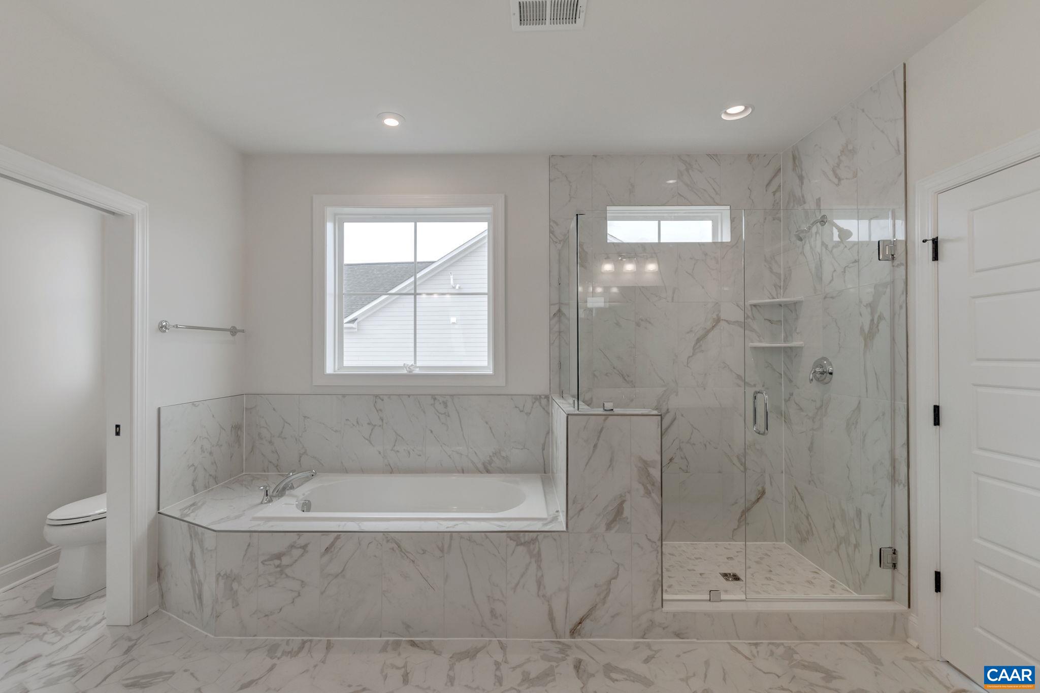 3012 Miranda Crossing Charlottesville, VA 22901 - Photo 32 of 57 a bathroom with a bathtub and shower