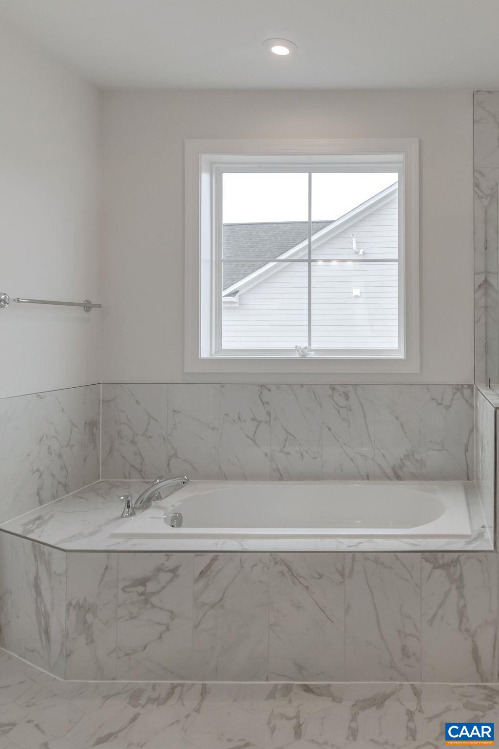 3012 Miranda Crossing Charlottesville, VA 22901 - Photo 33 of 57 a bathroom with a bathtub and window