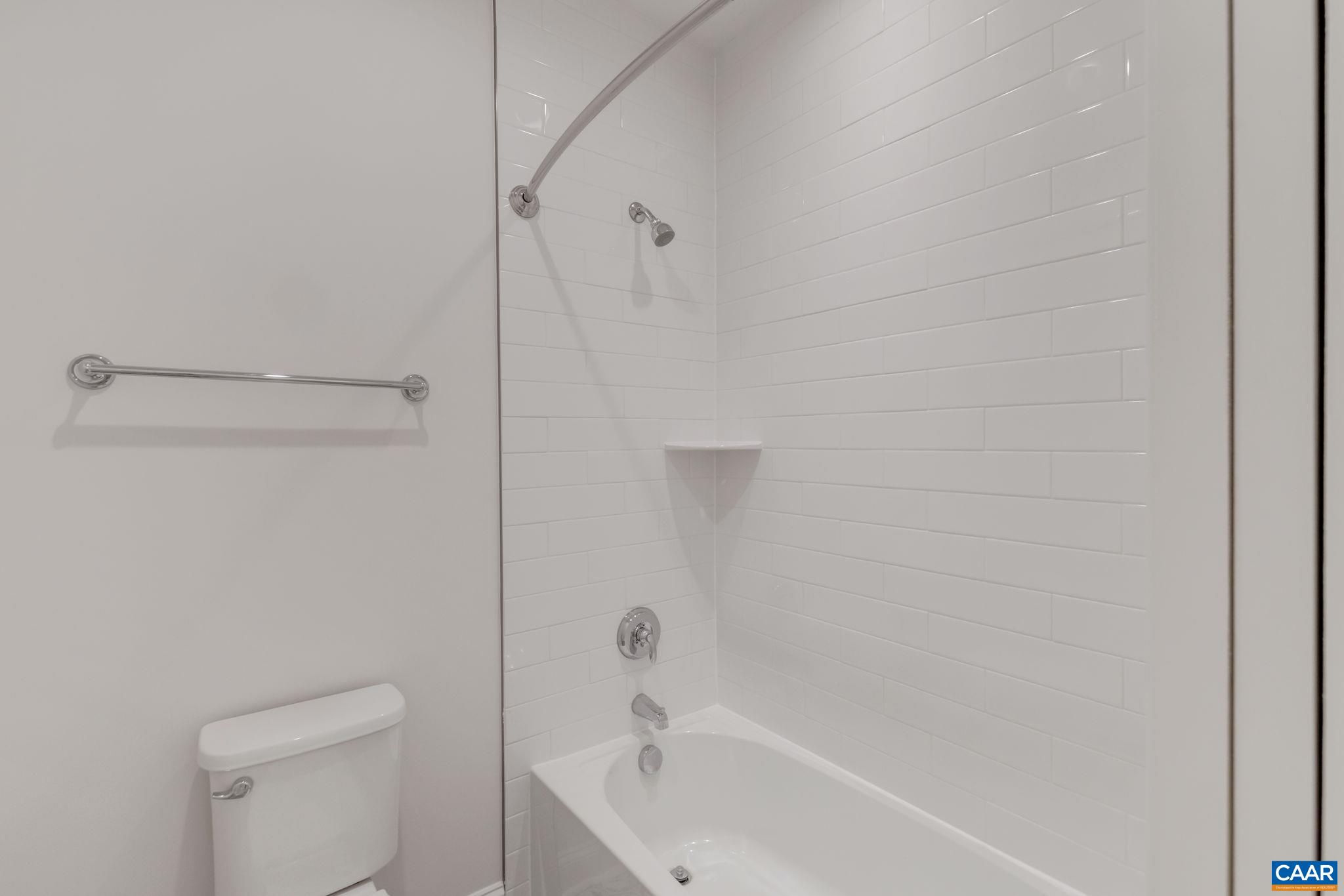 3012 Miranda Crossing Charlottesville, VA 22901 - Photo 41 of 57 a bathroom with a bathtub and a toilet