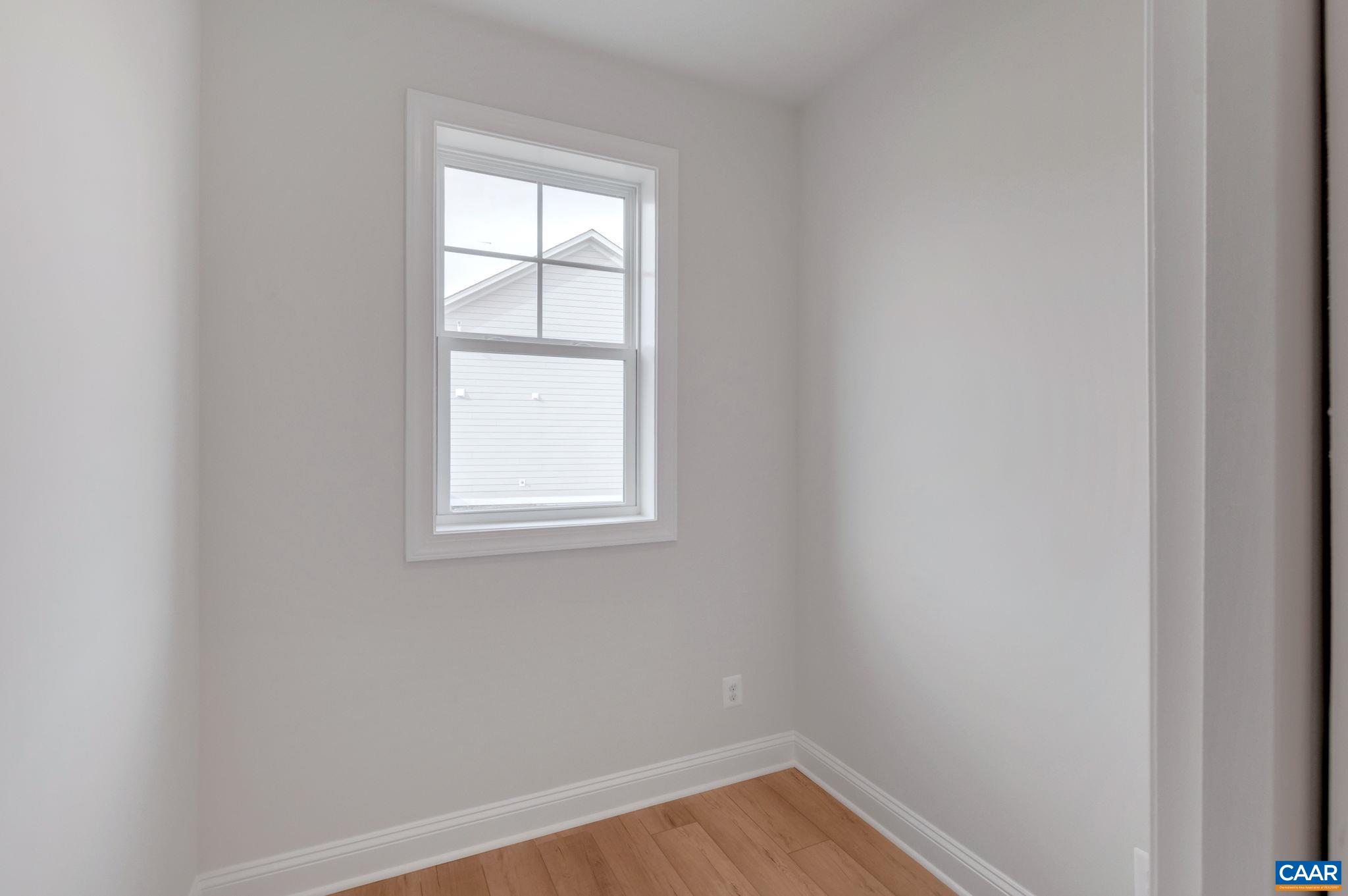 3012 Miranda Crossing Charlottesville, VA 22901 - Photo 42 of 57 a view of a small space with wooden floor and a window
