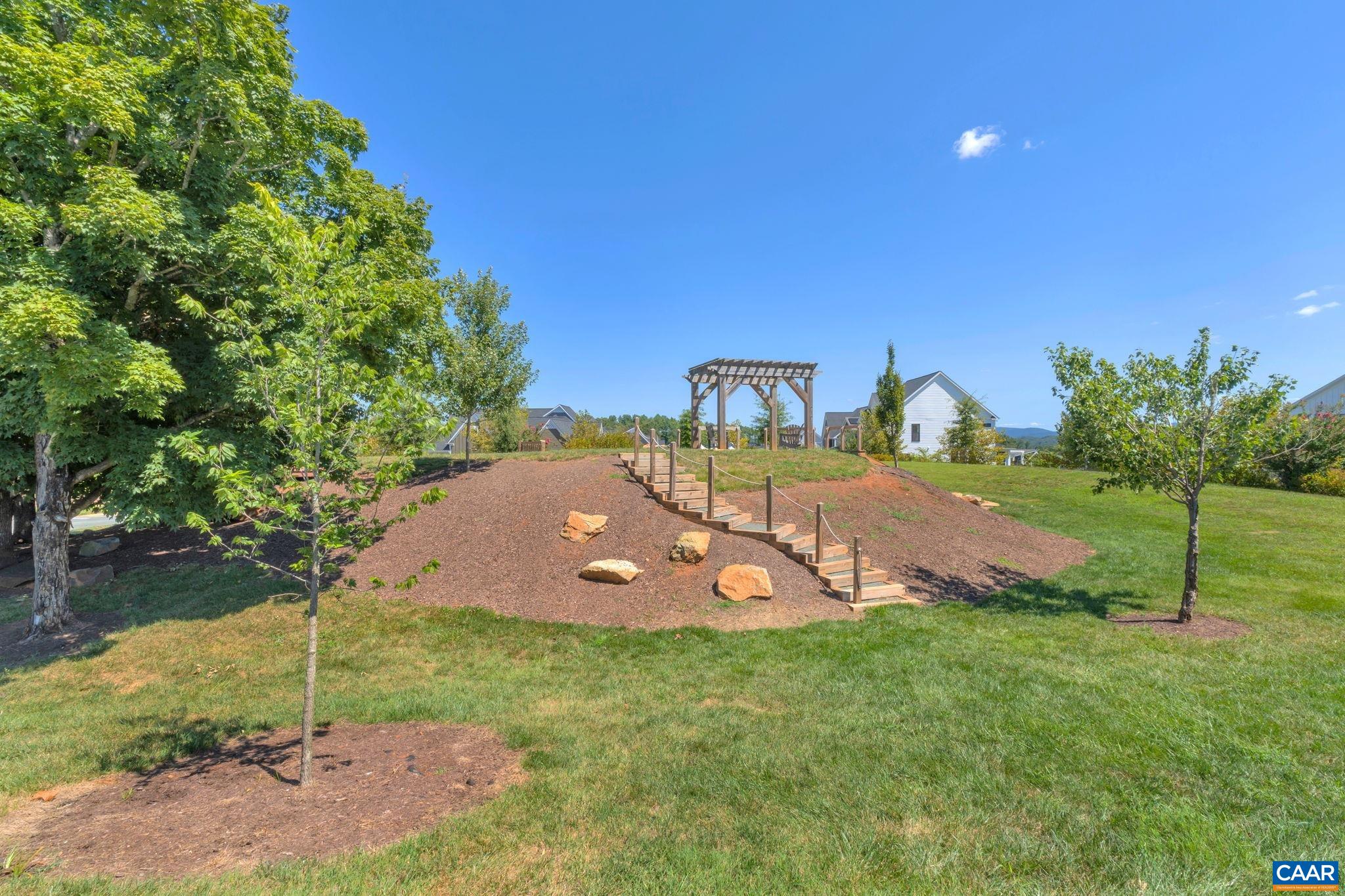 3012 Miranda Crossing Charlottesville, VA 22901 - Photo 53 of 57 a view of a house with a yard