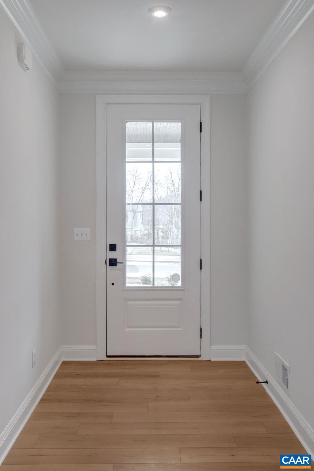 3012 Miranda Crossing Charlottesville, VA 22901 - Photo 9 of 57 an empty room with wooden floor and windows