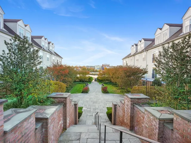 a view of a balcony with chairs