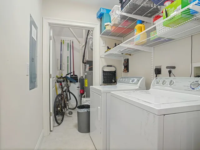 a view of a storage & utility room with washer and dryer