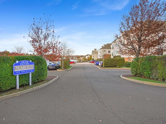 a view of street with parked cars