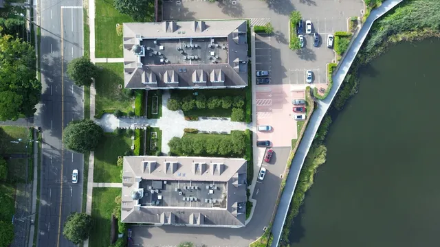 a view of a chairs and table in patio