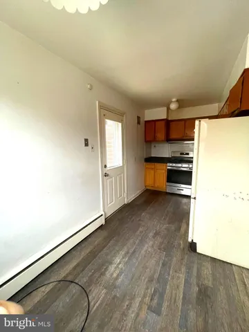 a view of kitchen and utility room