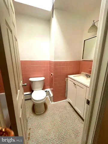 a bathroom with a sink and a toilet