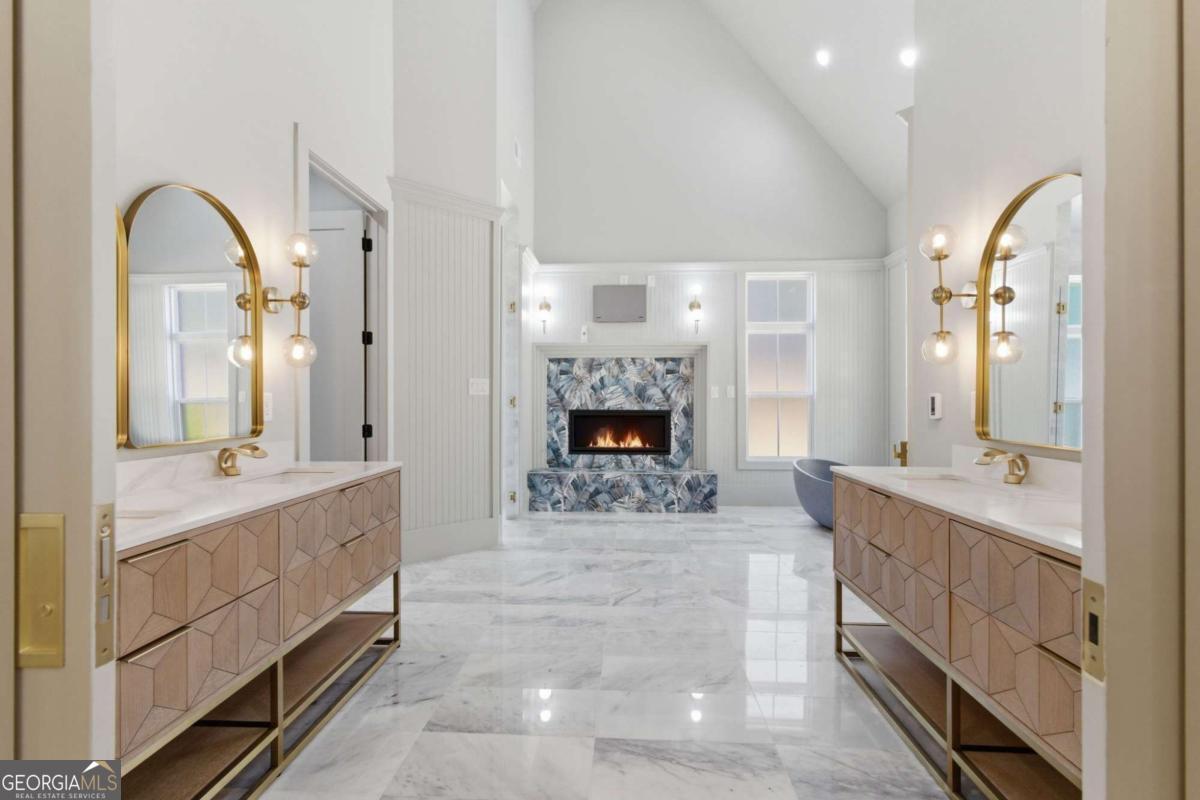 1315 Sandy Creek Road Tyrone, GA 30290 - Photo 72 of 100 a spacious bathroom with a double vanity sink and a mirror