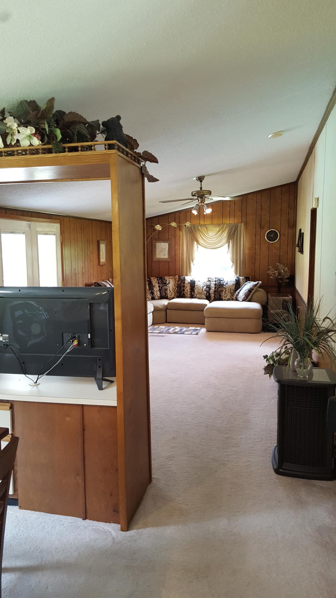 2771 Rutrough Road Southeast Roanoke, VA 24014 - Photo 20 of 31 a view of living room with furniture and a flat screen tv