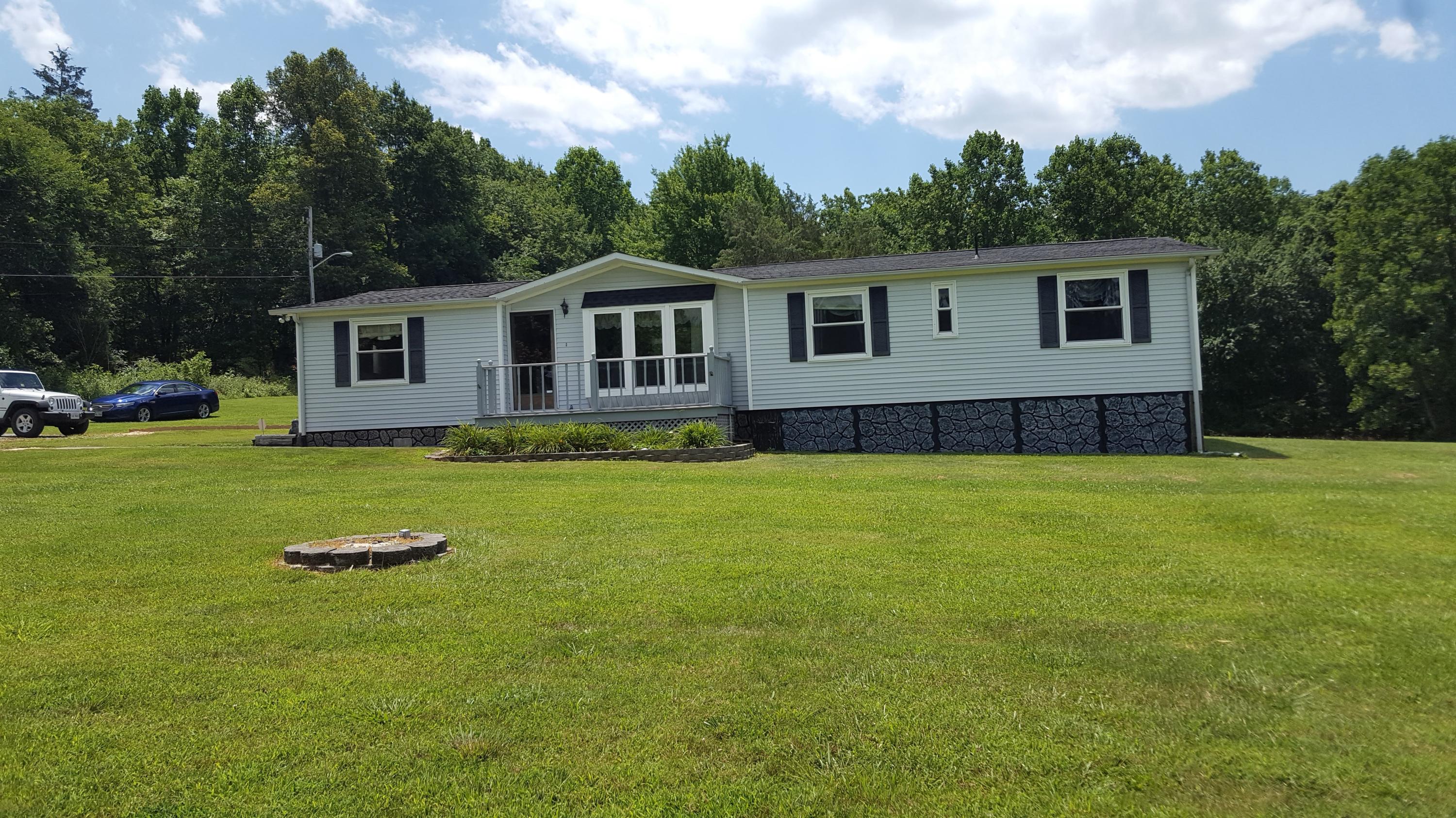 2771 Rutrough Road Southeast Roanoke, VA 24014 - Photo 25 of 31 a front view of a house with garden