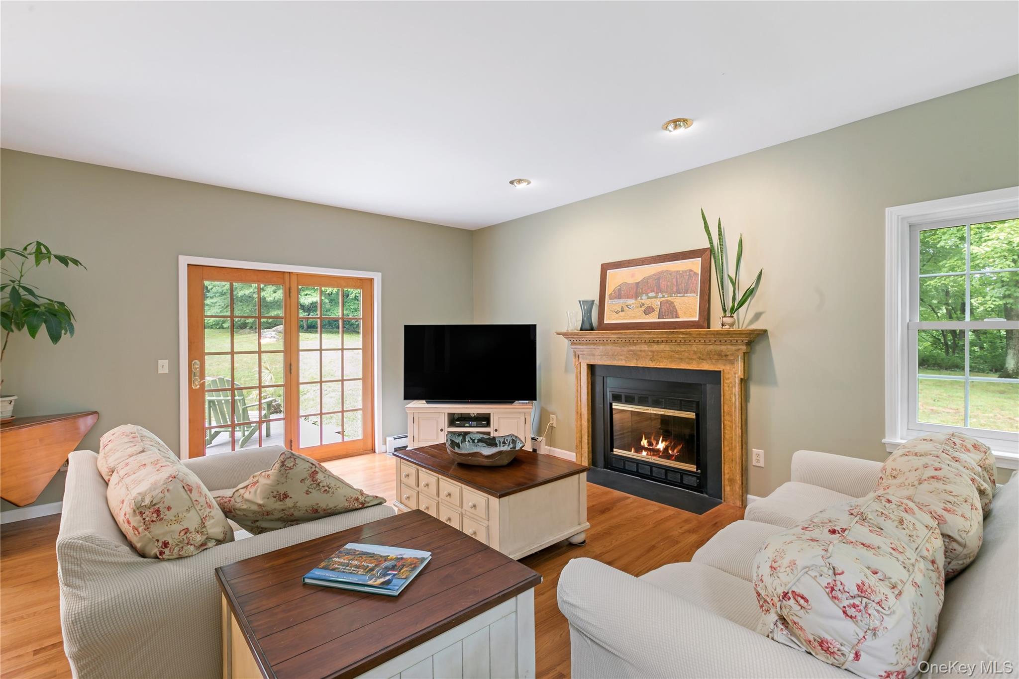 310 Avery Road Garrison, NY 10524 - Photo 4 of 26 Living Room with sliding glass doors to back deck