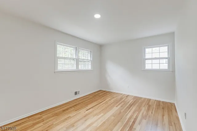 a bathroom with a sink a toilet and bathtub